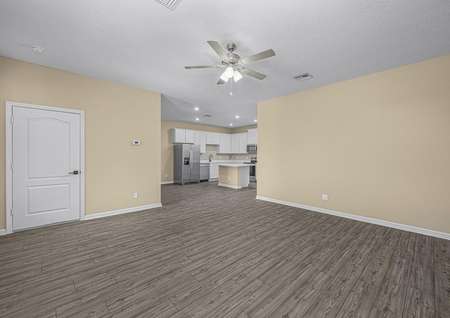 The family room is spacious and has easy access to the kitchen