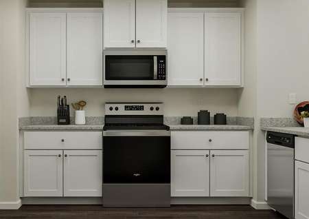 Rendering of the kitchen showcasing the
  white cabinetry, granite countertops and stainless steel appliances.