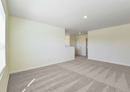 Upstairs game room with carpet