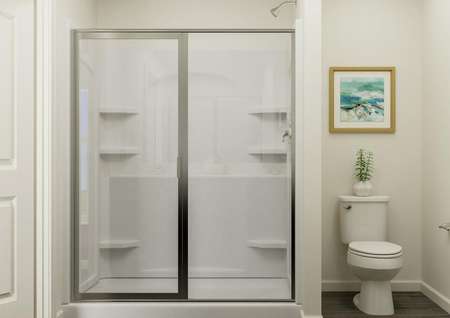 Rendering of the owner's bathroom
  featuring the glass door shower and toilet.