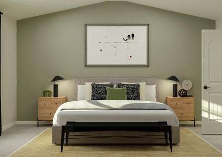 Rendering of the spacious master suite in
  the Avery floor plan. The room has a vaulted ceiling and carpeted flooring
  and has been furnished with a bed, nightstands and a bench.