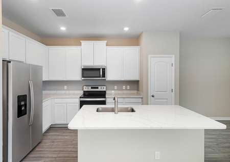 The heart of the home showcases all new, stainless steel appliances and stunning quartz countertops.
