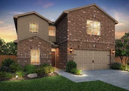 Artist rendering of the Driftwood by LGI Homes at dusk, in brown brick and tan siding with front yard landscaping and fence visible..