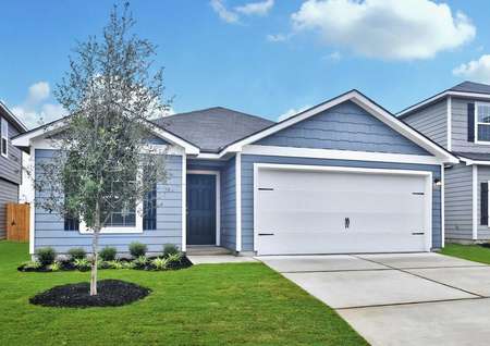 Frio finished house front view with blue siding, white garage door, and green landscaped yard