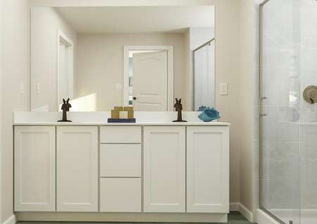 Rendering of master bath showing a toilet
  and abstract décor on left, double sink vanity with white cabinetry center,
  and glass shower door on right. 
