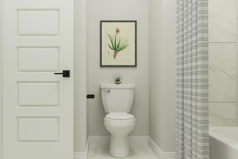 Rendering of a secondary bathroom
  featuring a toilet and shower behind a striped curtain.