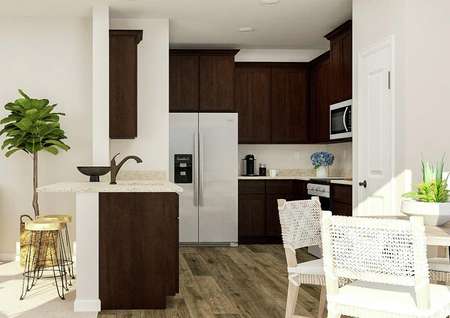 Rendering of the view into the kitchen
  from the dining area. The kitchen has large wood cabinets, a stainless steel
  refrigerator with ice maker and a breakfast bar. The media center of the
  living room is also visible.