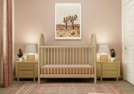 Rendering of a bedroom decorated as a
  nursey. The room has carpeted flooring and is furnished with a crib, two
  nightstands, rug and desert artwork.