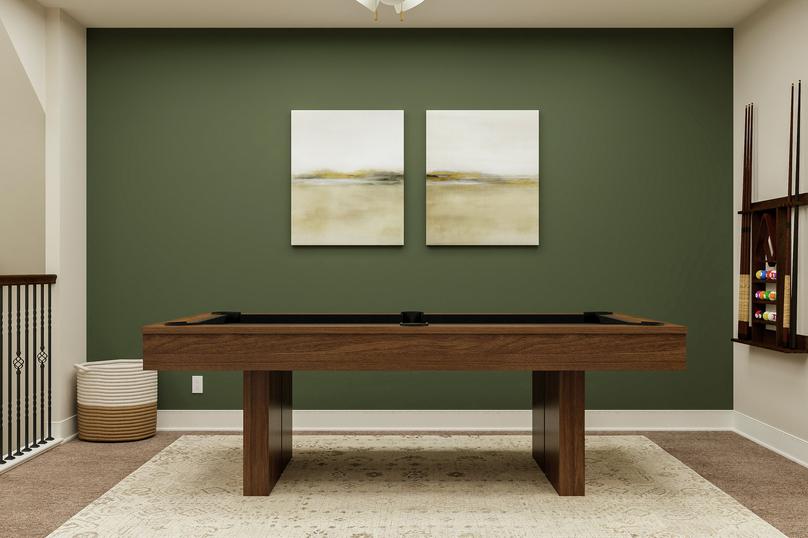 Rendering of loft space showing pool
  table along a green accent wall and beige carpet flooring throughout.