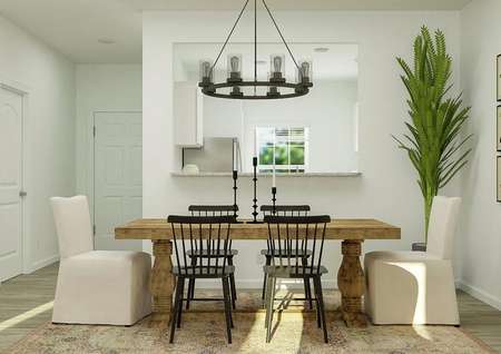 Rendering of dining
  area with large rectangular table with view to the kitchen.