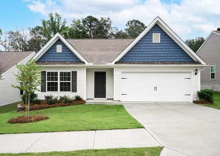 Exterior of the Allatoona with shutters and front yard landscaping.
