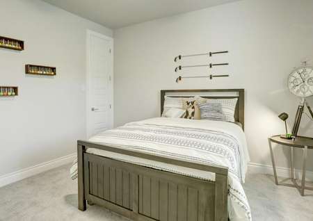 Staged bedroom with golf club decor.