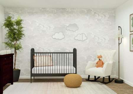 Rendering of a bedroom decorated as a
  nursery and furnished with a crib, dresser, rocking chair and mirrors in the
  shape of clouds.